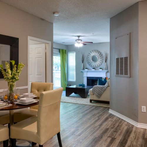 a living room with a dining table