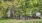 a black fence in a park