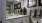 a bathroom with a countertop and ample lighting