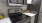 a microwave oven and a refrigerator in a kitchen