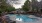 a swimming pool and trees