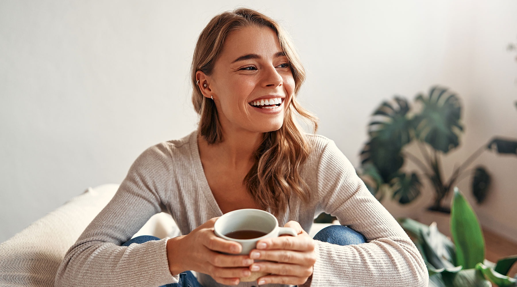 young woman with cup of coffee