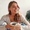 young woman with cup of coffee
