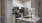a kitchen with white cabinets