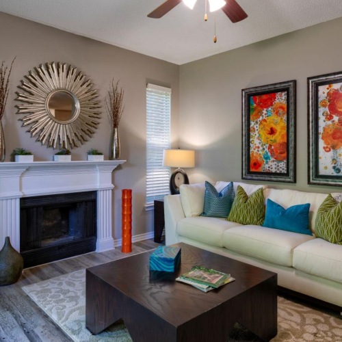 a living room with a fireplace